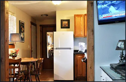 The Blue Duck Suite’s kitchen is equipped with dinette, range, refrigerator, microwave and coffee maker.