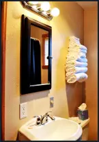 Freshen up in the Blue Duck Suite’s clean bathroom with tub-shower combo.