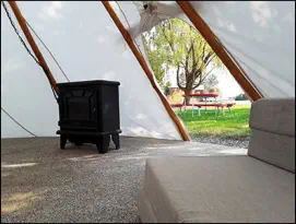 View of the Spirit Dancers Lodge from Inside the Hunter’s Tepee