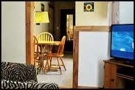 Dine in the Sunflower Cabin-Suite’s Kitchen with modern amenities at the Mountain View Motel & RV Park, a Joseph, Oregon Hotel